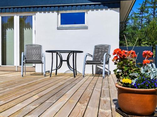 A patio or other outdoor area at 6 person holiday home in H jslev