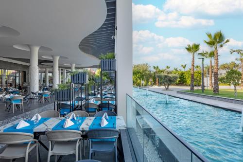 a view of the pool at the resort at Mövenpick Resort Antalya Tekirova - Ultra All Inclusive in Tekirova