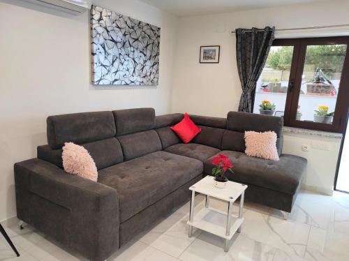 Χώρος καθιστικού στο Apartman Dino with heated pool