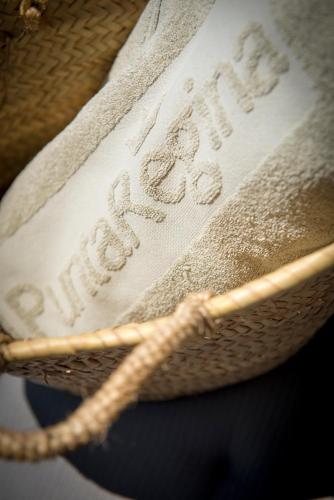 a close up of a pair of shoes with a rope at Hotel Punta Regina in Positano