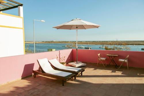 Photo de la galerie de l'établissement Casa Viana - Guesthouse, à Cabanas de Tavira