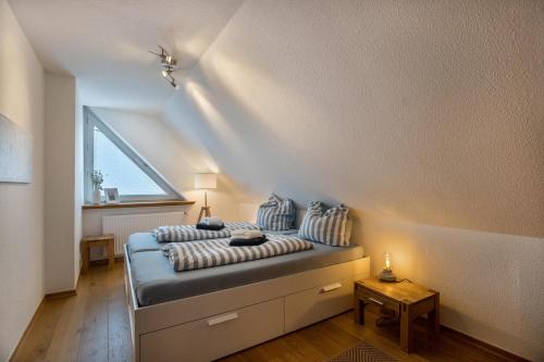 Postel nebo postele na pokoji v ubytování Ferienwohnung Uttied
