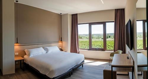 Postel nebo postele na pokoji v ubytování Hotel Bodega FyA - GRUPO PIÉROLA