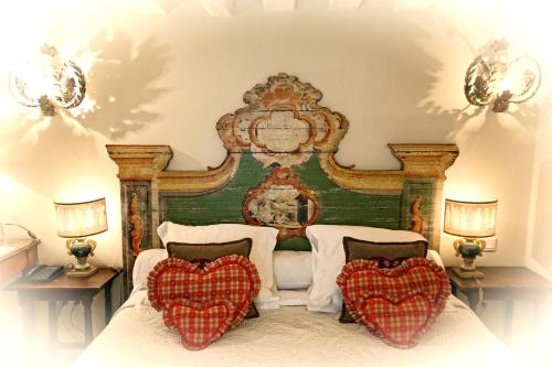 Ένα ή περισσότερα κρεβάτια σε δωμάτιο στο Grand Hôtel de l'Abbaye