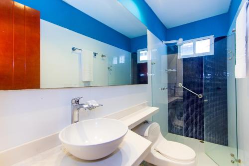 Phòng tắm tại Hotel Sabana del Sinu By GEH Suites