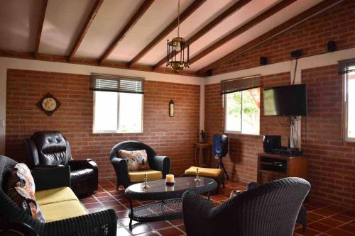 Posezení v ubytování Agradable casa de campo/ finca en el Carmen Valle