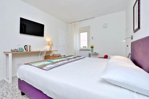 Ліжко або ліжка в номері Guest House Viaroma