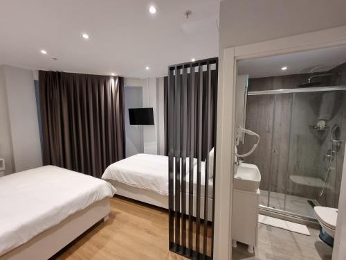 Koupelna v ubytování 10m2 Hotel