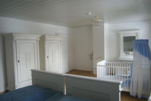 Ένα ή περισσότερα κρεβάτια σε δωμάτιο στο Ferienhaus Füchslein
