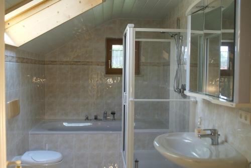 Ένα μπάνιο στο Ferienhaus Füchslein