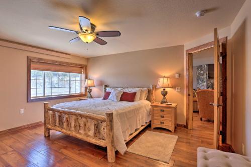 A bed or beds in a room at Modern Deadwood Apt with Mountain Views and Grill!