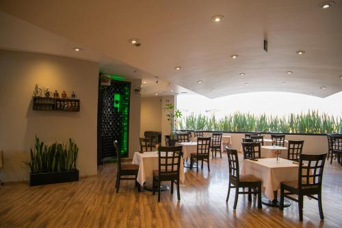 En restaurant eller et andet spisested på Hotel Brasilia