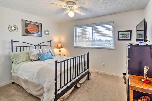 a bedroom with a bed and a ceiling fan at Spacious Tacoma Getaway 2 Mi to Old Town! in Tacoma