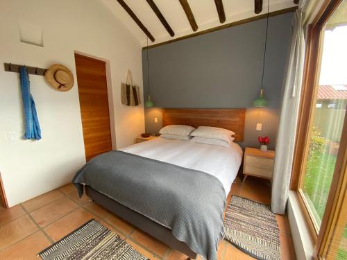 Säng eller sängar i ett rum på Casas del Viento