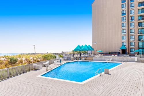 a swimming pool on the roof of a building at Sea Colony - 19006 Lakeview Court in Bethany Beach