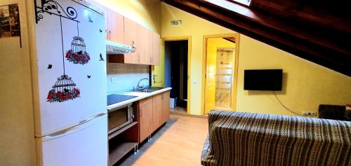 Apartamentos El Puntual tesisinde mutfak veya mini mutfak