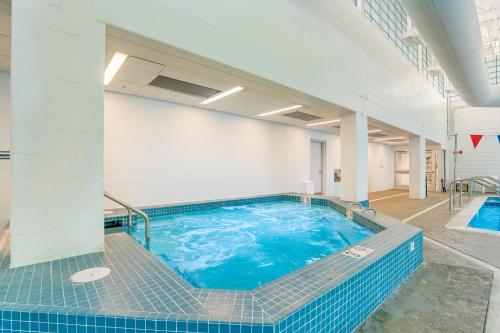 a large swimming pool in a building at Sea Colony - 1804 Doubles in Bethany Beach