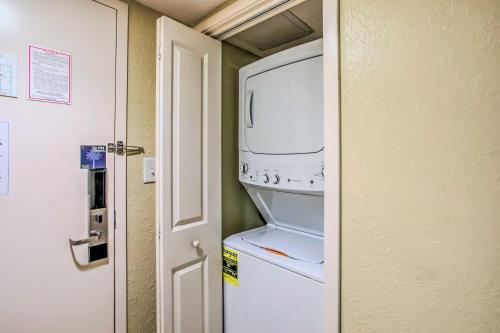 a refrigerator with its door open in a room at Beachfront Family Condo with View and Pool Access in Myrtle Beach