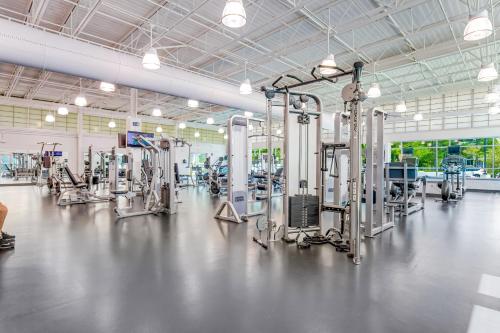 a large gym with a lot of machines at Sea Colony Pine Lake II in Bethany Beach