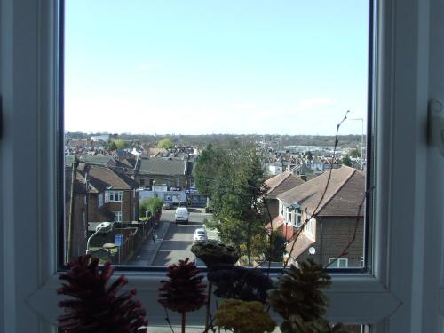 a view of a city from a window at Muswell Hill Apartment FREE PARKING in London