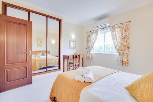 Cama o camas de una habitación en Alvor Vila Marachique Apartment