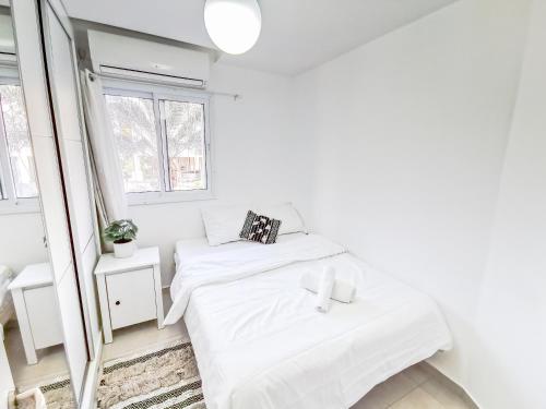 Llit o llits en una habitació de Great Location Fully Equipped