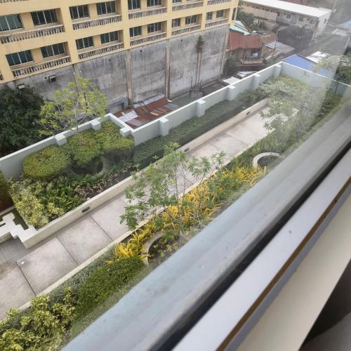 an overhead view of a street with a building at Avida Davao by davaobnb & Lemonique Homes in Davao City