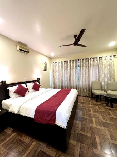 Postel nebo postele na pokoji v ubytování Hotel Sagarmatha