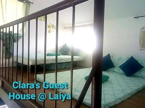 Ένα ή περισσότερα κρεβάτια σε δωμάτιο στο Clara's Guest House at Laiya