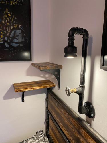 a bathroom with a pipe on the wall at Penzio Ostrava in Ostrava
