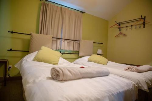 Postel nebo postele na pokoji v ubytování B&B De Pethaan