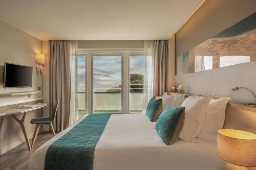 Hôtel Le B d'Arcachon by Inwood Hotelsにあるベッド