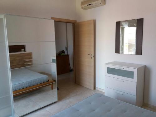 Posteľ alebo postele v izbe v ubytovaní Appartamento centralissimo Marina di Ragusa