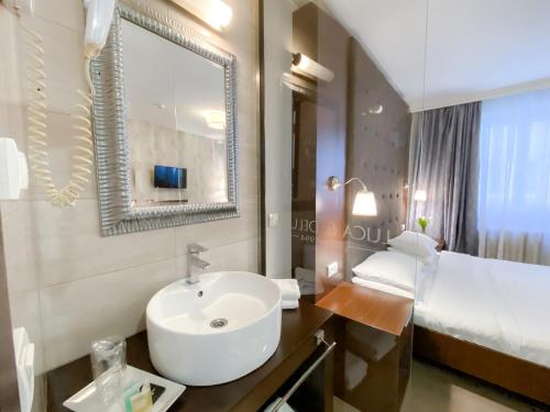 Postel nebo postele na pokoji v ubytování Luka de Luka Suites