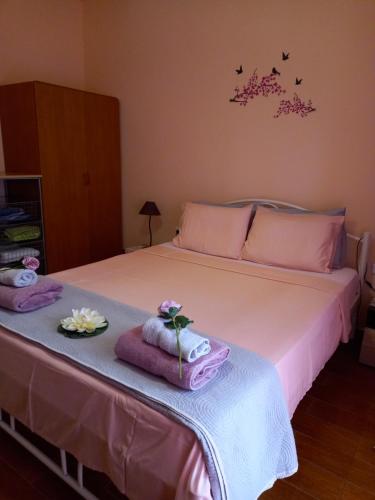 Postel nebo postele na pokoji v ubytování Peramos Apartments