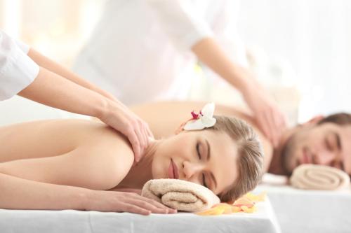a woman getting a massage at a spa at Royal Blue Hotel in Dubrovnik