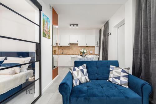 Posteľ alebo postele v izbe v ubytovaní Morski Apartament Arciszewskiego by Noclegi Renters