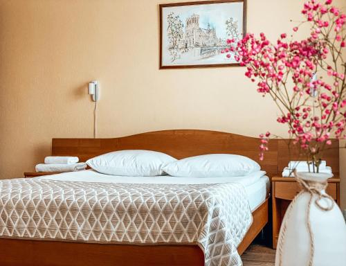 Кровать или кровати в номере Отель Конаково