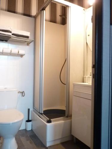 a bathroom with a shower and a toilet at "la suite" in Talant