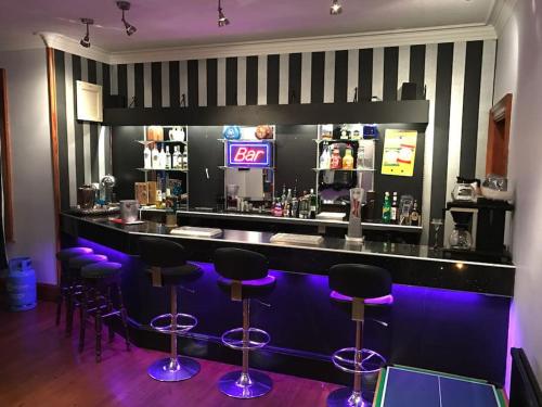 Salon ili bar u objektu The Brunstane Lodge