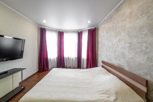 Ліжко або ліжка в номері Centralnye Apartments