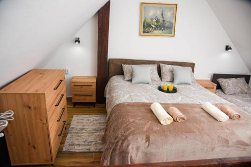 Кровать или кровати в номере Apartman Lily