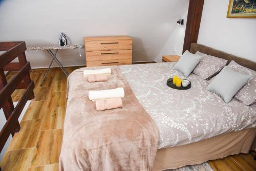 Кровать или кровати в номере Apartman Lily