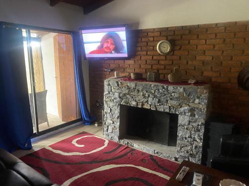 TV a/nebo společenská místnost v ubytování Escape a la Naturaleza