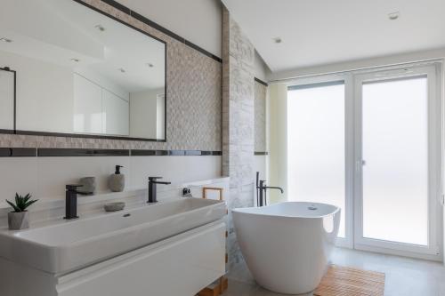 Ένα μπάνιο στο Noir Hotel - Penthouse Apartman