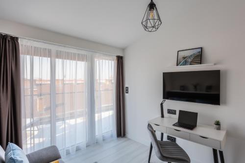 Μια τηλεόραση ή/και κέντρο ψυχαγωγίας στο Noir Hotel - Penthouse Apartman
