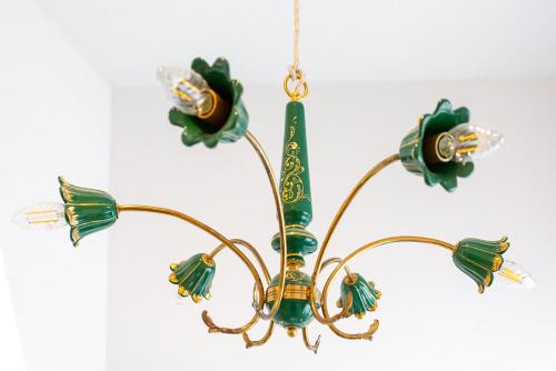 a chandelier hanging from a ceiling at Da Pina e Quinto Home in Morciano di Romagna