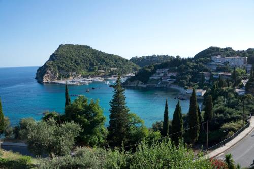 a view of a bay with boats in the water at Teo & Niki in Paleokastritsa