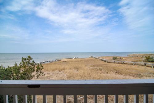 a view of the beach from a balcony at The Inn on Pamlico Sound in Buxton