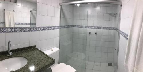 Um banheiro em Hotel Cocal